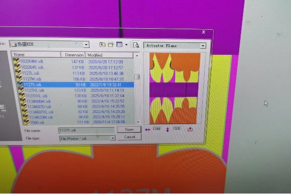 Custom Bulk Orders with Seamless Manufacturing alt with keywords: A computer screen showing a digital design of seamless underwear next to the finished product